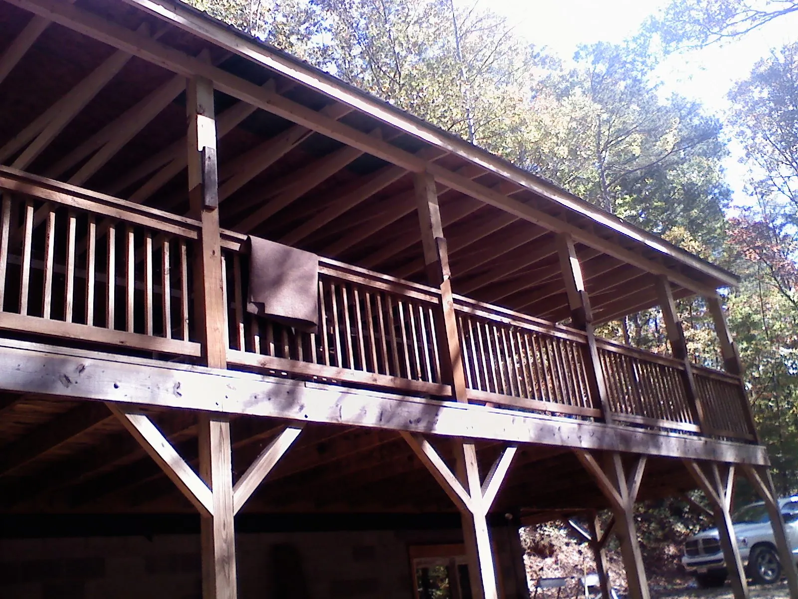 Timber framing under a new elevated porch and deck — Roof Leak Repair in Pottsboro by Roofing Brothers